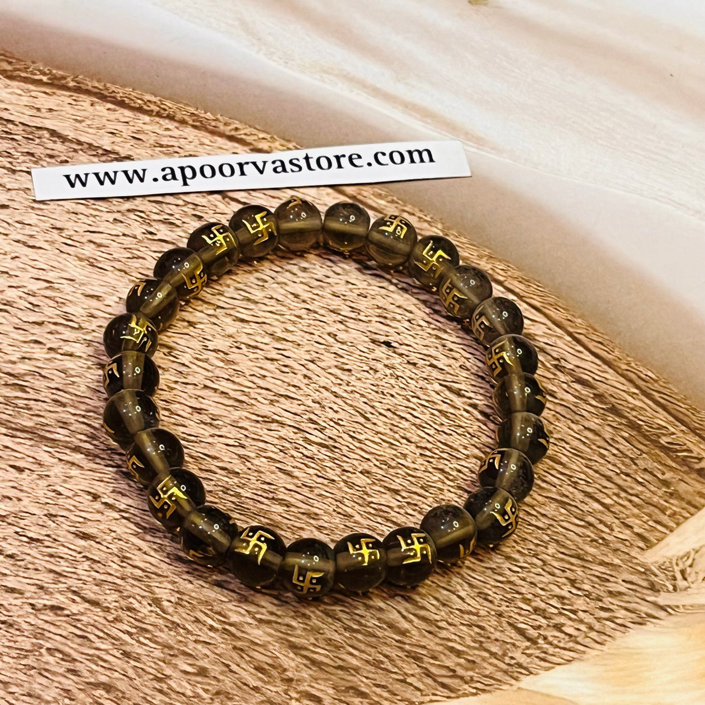 Swastik Smokey Quartz Handmade bracelet by Crystall and Herbs